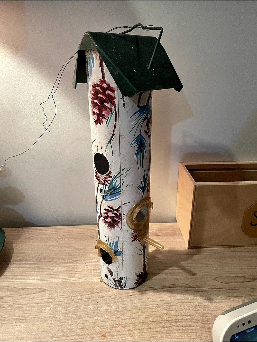 Painted metal bird feeder